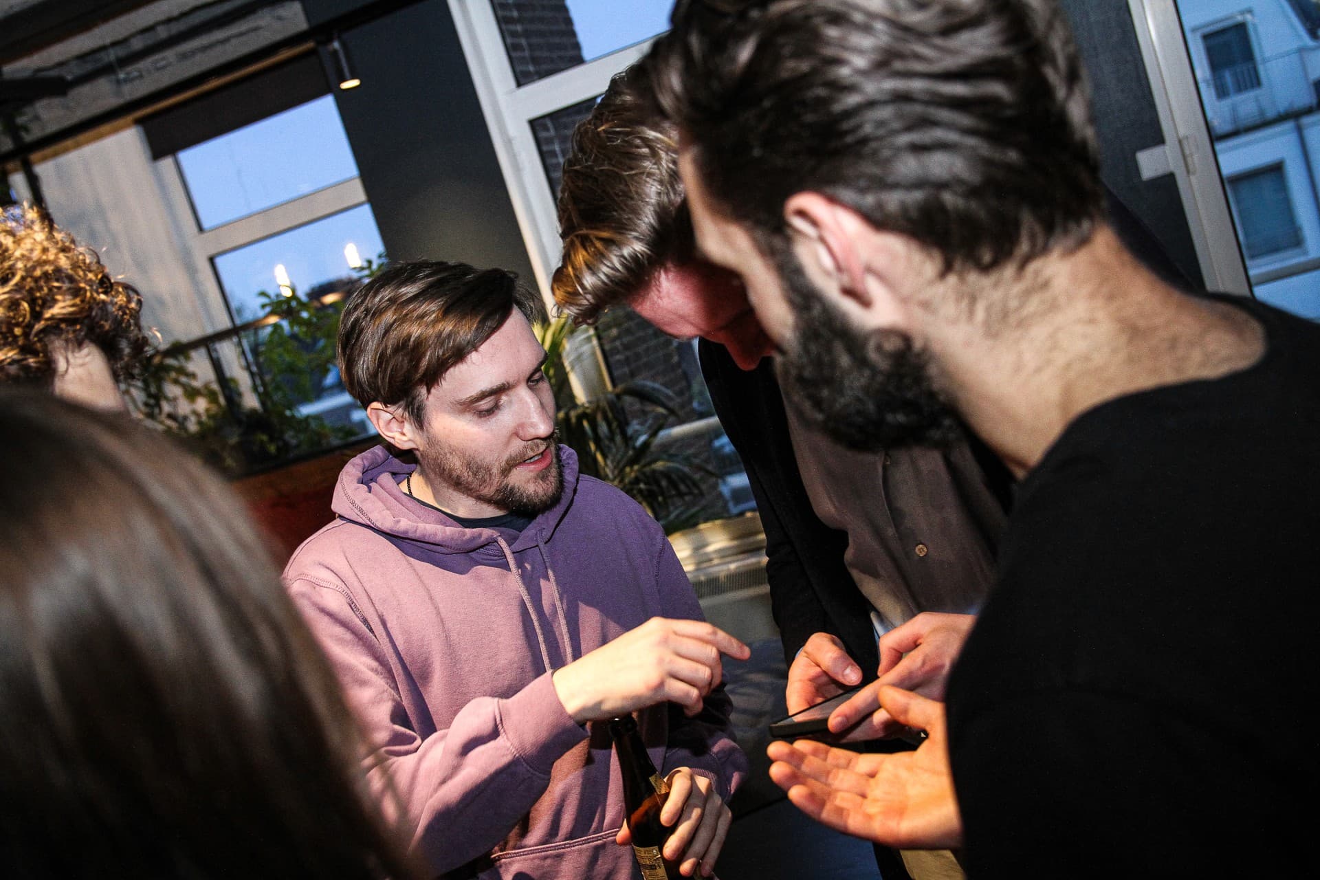 Two members talking one to one at the edge of an event